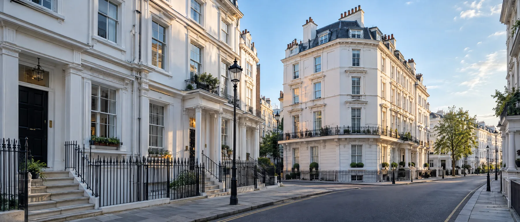 White stucco terraces and a mansion block converted into flats in Central London