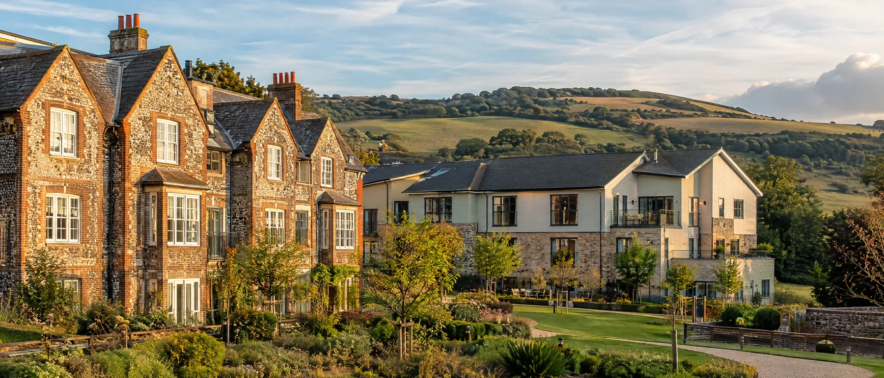 Period buildings converted to apartments with the South Downs behind, West Sussex